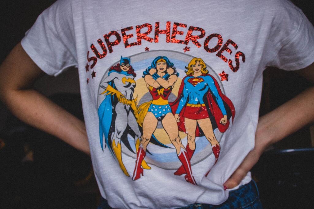 T-shirt with superheroes printed onto it. 