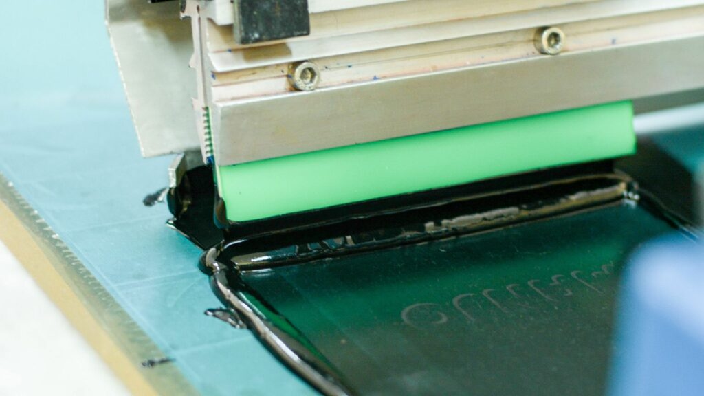 A screen printing machine at work