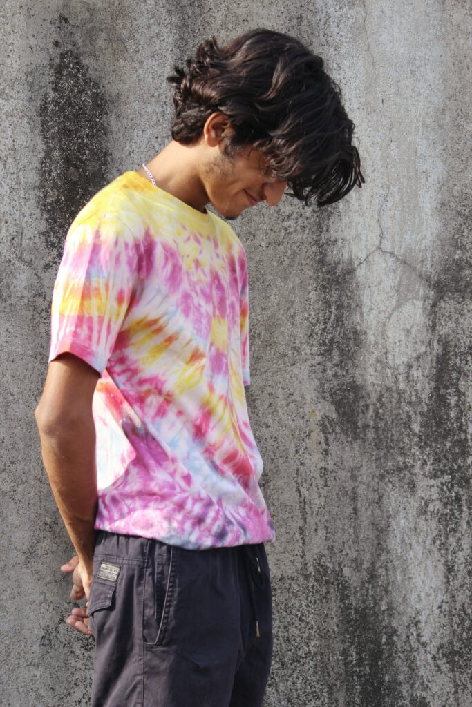A man wearing a dye sublimated shirt