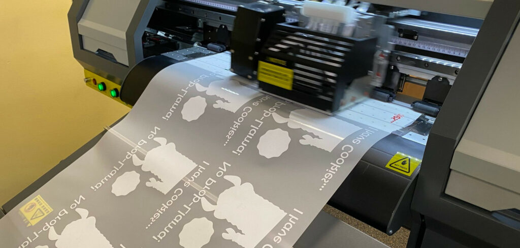 A DTF printer printing on transfer film