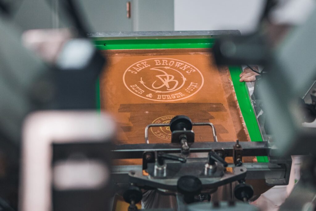 A screen printing press in operation
