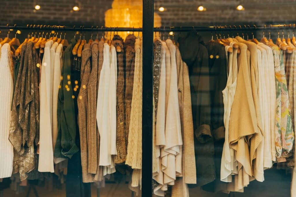 A rack of clothes inside a clothing store